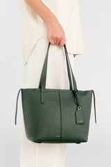 Profile view of model wearing the Oroton Lilly Small Shopper Tote in Fern and Pebble leather for Women