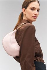 Profile view of model wearing the Oroton Florence Small Shoulder Bag in Floss and Smooth leather for Women