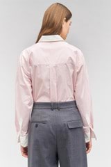 Profile view of model wearing the Oroton Contrast Collar Shirt in Pink Blush and 100% cotton for Women