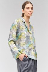 Profile view of model wearing the Oroton French Map Camp Shirt in Multi and 100% silk for Women