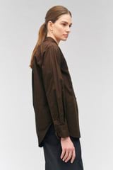 Profile view of model wearing the Oroton Doilie Detail Overshirt in Bitter Choc and 100% cotton for Women