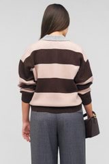 Profile view of model wearing the Oroton Stripe Rugby Knit in Bitter Choc and 100% wool for Women