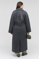Profile view of model wearing the Oroton Long Line Coat in Charcoal and 100% wool for Women