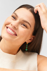 Profile view of model wearing the Oroton Pietra Drop Earrings in 18K Worn Gold/Malachite and Semi precious stone paste for Women