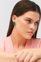 Profile view of model wearing the Oroton Pietra Earrings in 18K Worn Gold/Malachite and Brass for Women