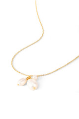 Detail product shot of the Oroton Kimberley Pearl Charm Necklace in Gold/Pearl and Brass for Women