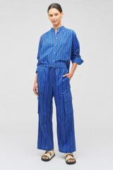 Profile view of model wearing the Oroton Swedish Stripe PJ Pant in Folk Blue and 100% cotton for Women