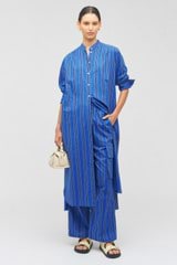 Profile view of model wearing the Oroton Swedish Stripe PJ Pant in Folk Blue and 100% cotton for Women