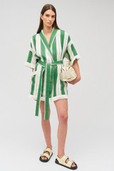 Profile view of model wearing the Oroton Deckchair Stripe Robe in Clover and 100% linen for Women