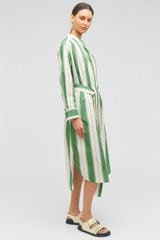Profile view of model wearing the Oroton Deckchair Stripe Shirt Dress in Clover and 100% cotton for Women