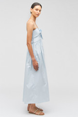 Profile view of model wearing the Oroton Lace Trim Sundress in Windmill Blue and 100% cotton for Women