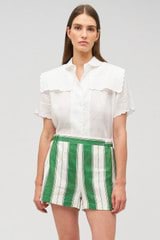 Profile view of model wearing the Oroton Deckchair Stripe Short in Clover and 100% linen for Women