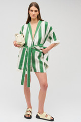 Profile view of model wearing the Oroton Deckchair Stripe Short in Clover and 100% linen for Women