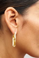 Profile view of model wearing the Oroton Livia Enamel Drop Earring in Worn Gold/Antique White and  for Women