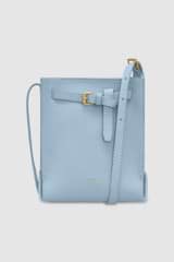 Front product shot of the Oroton Margot Tiny Bucket Bag in Denim and Smooth Leather exterior for Women