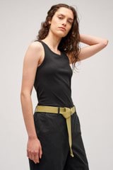 Profile view of model wearing the Oroton Lottie Rib Tank in Black and 92% Cotton / 8% Spandex for Women