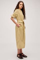 Profile view of model wearing the Oroton Cleo Poplin Dress in Wheat and 100% Cotton Poplin for Women