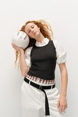 Profile view of model wearing the Oroton Wren Poplin Shirt in Antique White and Made from 100% poplin cotton  for Women