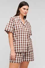 Profile view of model wearing the Oroton Gingham Camp Shirt in Chocolate and 100% Cotton for Women