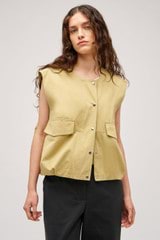 Profile view of model wearing the  Cotton Twill Vest in  and  for Women