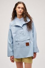 Profile view of model wearing the  Cotton Cagoule in Denim Blue and  for Women