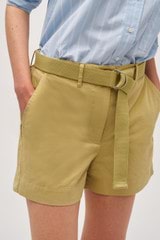 Profile view of model wearing the  Quinn Webbing Belt in Wheat and 100% Cotton Webbing for Women