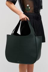 Profile view of model wearing the Oroton Emilia Large Tote in Vine and  for Women