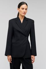 Profile view of model wearing the Oroton Wrap Blazer in Black and 98% wool,  2% elastane material for Women