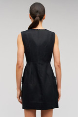 Profile view of model wearing the Oroton Rosebud Lace Mini Dress in Black and 100% linen material for Women