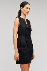 Profile view of model wearing the Oroton Rosebud Lace Mini Dress in Black and 100% linen material for Women