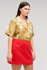 Profile view of model wearing the Oroton Embellished Rosebud Camp Shirt in Camel and 100% Silk Material for Women