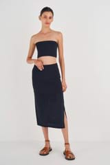 Profile view of model wearing the Oroton Stitch Detail Skirt in North Sea and 83% Viscose, 17% Polyester for Women