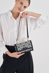 Oroton Lena Small Clutch in Black and Oroton Signature Recycled Jacquard Fabric. Smooth Leather for Women