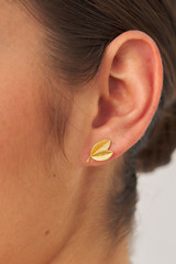 Profile view of model wearing the Oroton Sage Cluster Studs in Worn Gold and  for Women