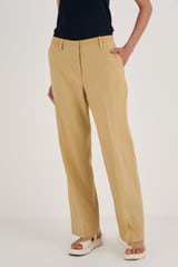 Profile view of model wearing the Oroton Relaxed Leg Pant in Raffia and 81% Viscose, 17% Cotton, 2% Elastane for Women