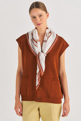 Profile view of model wearing the Oroton Polly Scarf in Cognac and Printed Polyester for Women