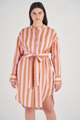 Profile view of model wearing the Oroton Long Sleeve Linen Stripe Shirt Dress in Brandy and 100% Linen for Women