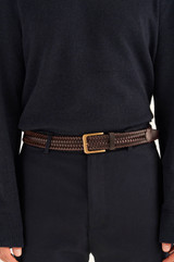 Profile view of model wearing the Oroton Lucas Woven Belt in Bitter Chocolate and Vegan Leather for Men