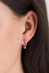 Profile view of model wearing the Oroton Keely Hoops in Silver/Turquoise and  for Women