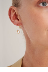 Profile view of model wearing the Oroton Skye Pearl Hoops in Gold and Brass Base With 18CT Gold Plating for Women