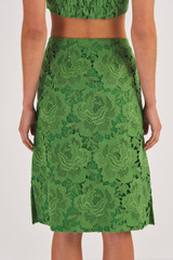 Profile view of model wearing the Oroton Lace A Line Skirt in Garden and 100% Polyester for Women
