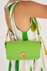Profile view of model wearing the Oroton Kerr Small Day Bag in Garden and Smooth Leather for Women