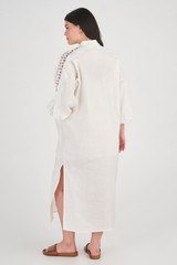 Profile view of model wearing the Oroton Geo Ric Rac Column Dress in Antique White and 100% Linen for Women