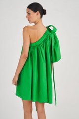 Profile view of model wearing the Oroton One Shoulder Gathered Dress in Meadow and 100% Cotton for Women