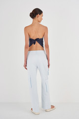 Profile view of model wearing the Oroton Pocket Pant in Sea Glass and 99% Cotton, 1% Spandex for Women