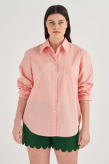 Profile view of model wearing the Oroton Poplin Long Sleeve Shirt in Primrose and 100% Cotton for Women