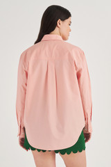 Profile view of model wearing the Oroton Poplin Long Sleeve Shirt in Primrose and 100% Cotton for Women