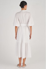 Profile view of model wearing the Oroton Poplin Gathered Dress in White and 100% Cotton for Women