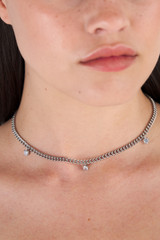 Profile view of model wearing the Oroton Keely Necklace in Silver/Clear and  for Women