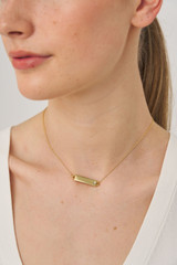 Profile view of model wearing the Oroton Zizi Necklace in Gold/Clear and  for Women